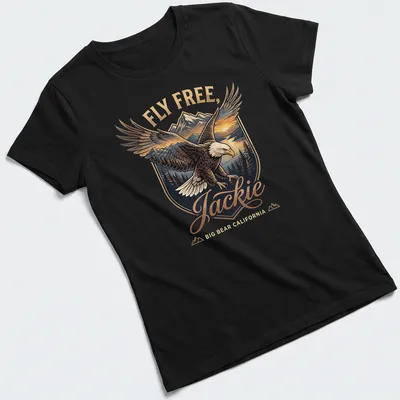 Vintage emblem print featuring a Bald Eagle with the text Fly Free, Jackie Big Bear California — printed on a women's shirt