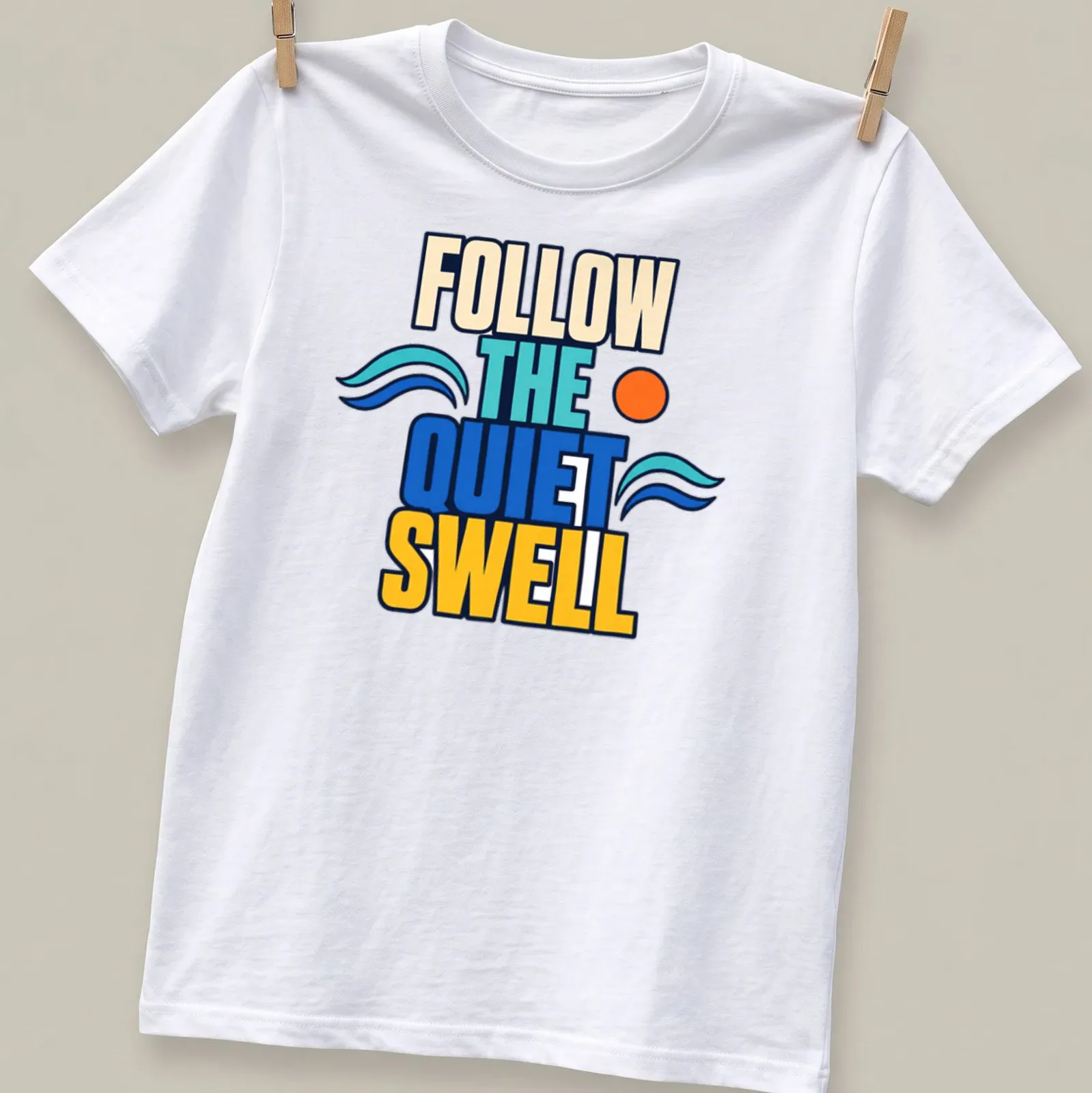 Bold colorful design of ocean waves with text 'Follow The Quiet Swell' — printed on a unisex t-shirt