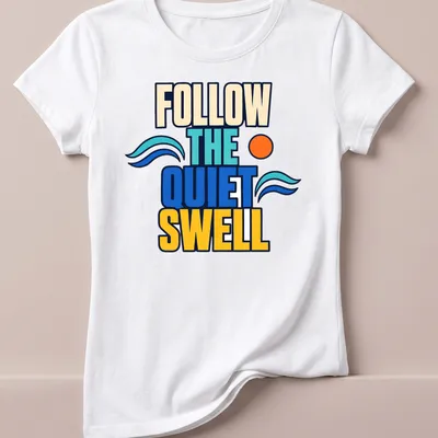 Bold colorful design of ocean waves with text 'Follow The Quiet Swell' — printed on a women's shirt