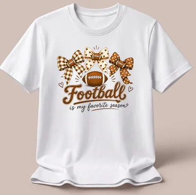 Whimsical design of footballs and bows with the text 'Football is my favorite season' — printed on a unisex t-shirt