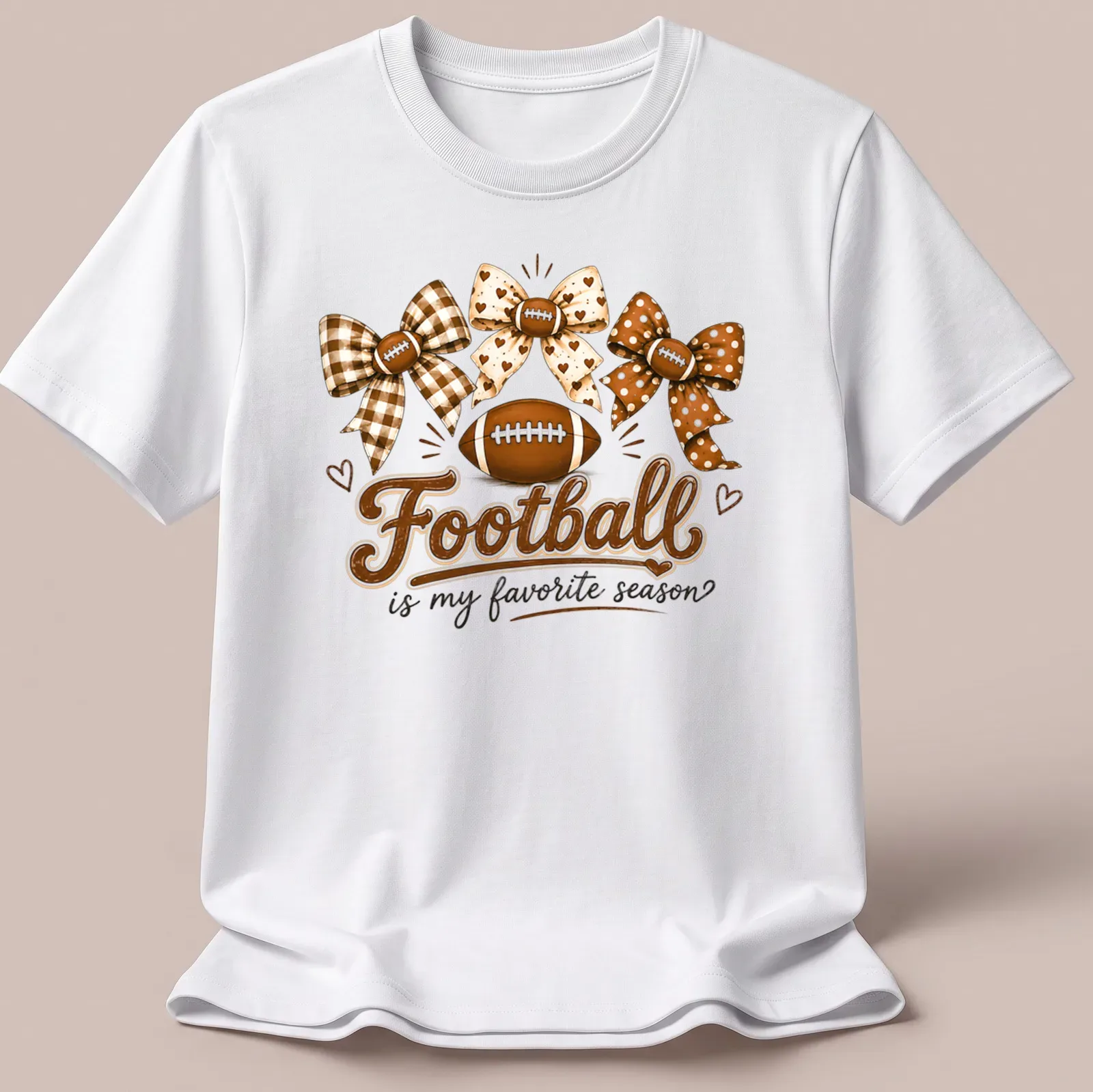 Whimsical design of footballs and bows with the text 'Football is my favorite season' — printed on a unisex t-shirt