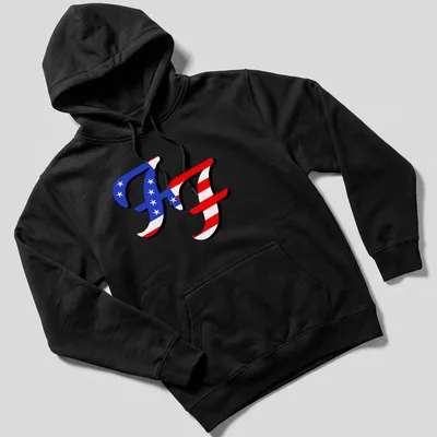 Bold graphic t-shirt featuring American flag lettering with 'Freedom Fighter' text — printed on a unisex hoodie