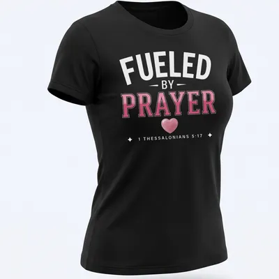 Bold typography t-shirt featuring a heart and the message about prayer — printed on a women's shirt