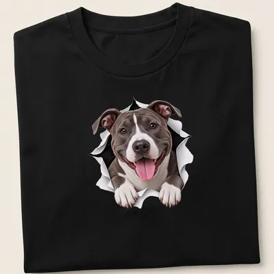 Realistic graphic of a cute American Staffordshire Terrier peeking out in gray, white, and black — printed on a unisex t-shirt