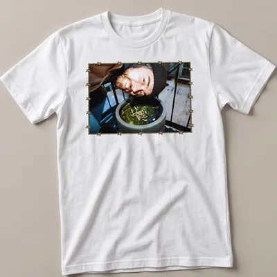 T-shirt featuring geese band members illustrated with a barbed wire border
