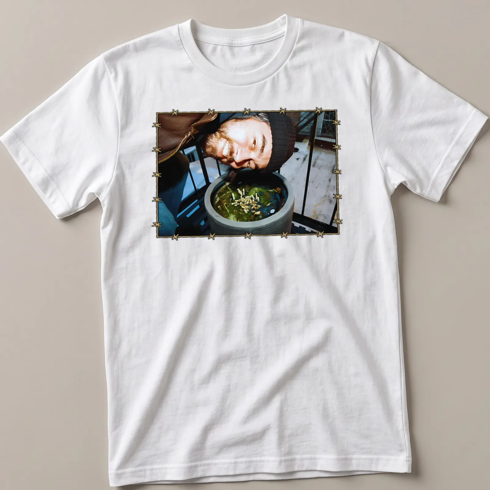 T-shirt featuring geese band members illustrated with a barbed wire border — printed on a unisex t-shirt