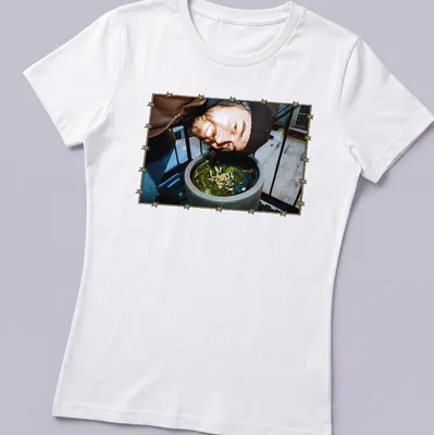 T-shirt featuring geese band members illustrated with a barbed wire border — printed on a women's shirt