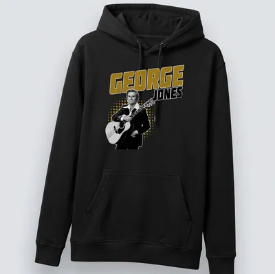 Vintage-style t-shirt featuring George Jones with a guitar in black, gold, and white — printed on a unisex hoodie