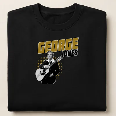 Vintage-style t-shirt featuring George Jones with a guitar in black, gold, and white — printed on a unisex sweatshirt