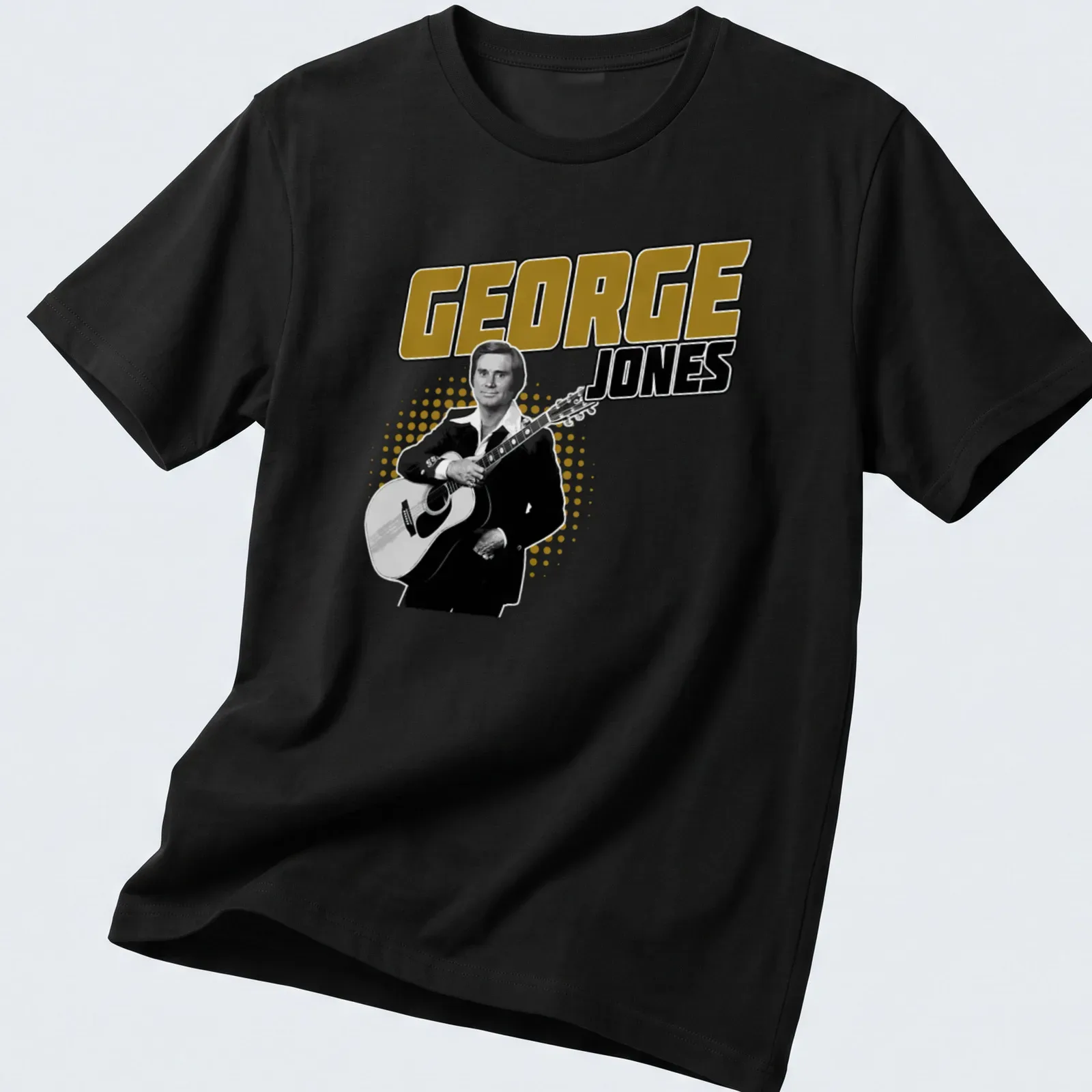 Vintage-style t-shirt featuring George Jones with a guitar in black, gold, and white — printed on a unisex t-shirt