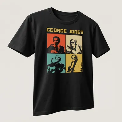 Colorful pop art shirt featuring George Jones's portrait in orange, yellow, teal, and white — printed on a unisex t-shirt (angled view)