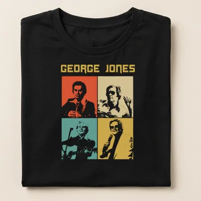 Colorful pop art shirt featuring George Jones's portrait in orange, yellow, teal, and white — printed on a women's shirt