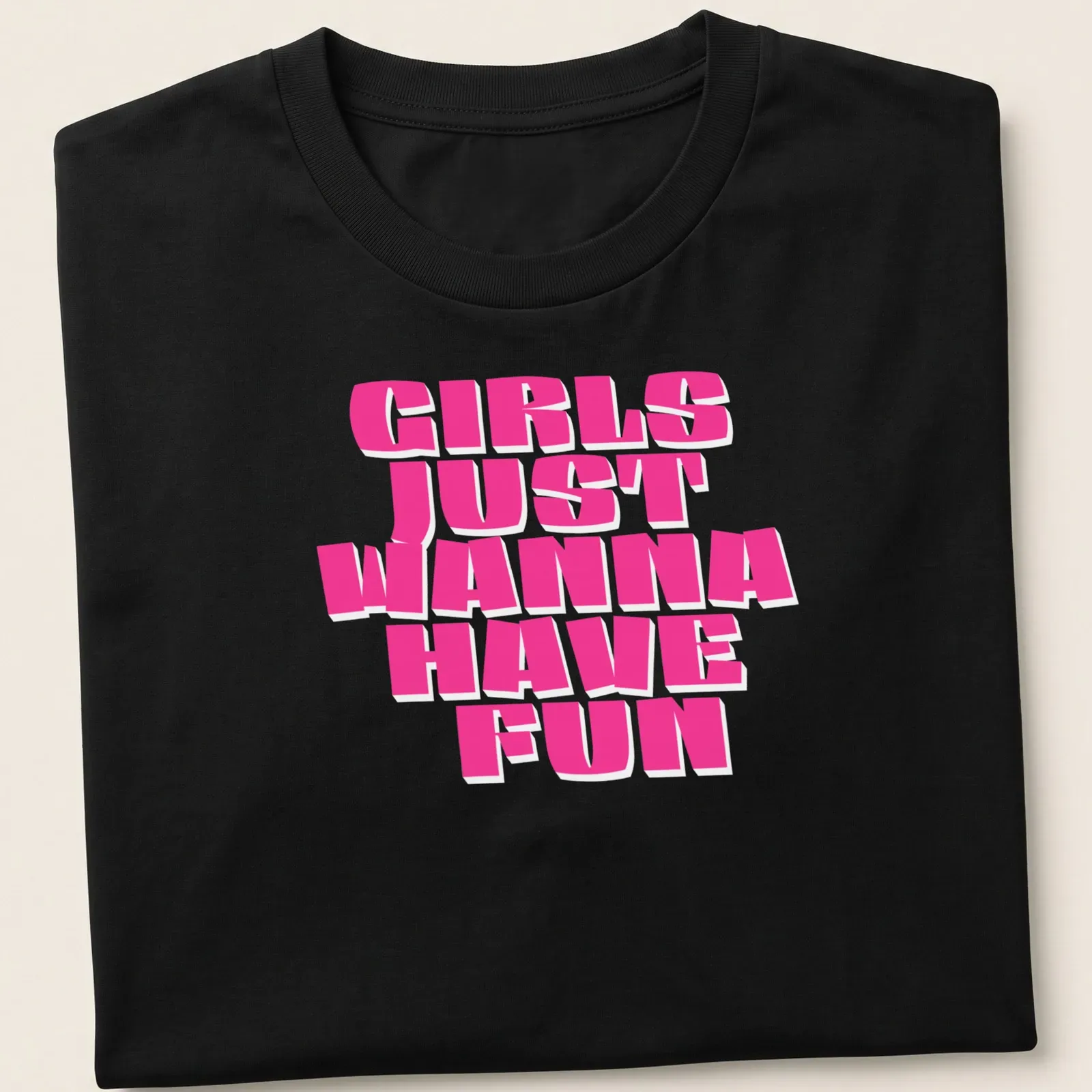 Bold pink text Girls Just Wanna Have Fun — printed on a unisex t-shirt