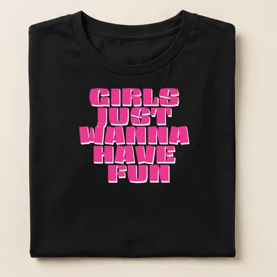 Bold pink text Girls Just Wanna Have Fun — printed on a women's shirt