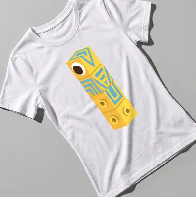 Playful cartoon geometric cube character in yellow, blue, and brown — printed on a women's shirt