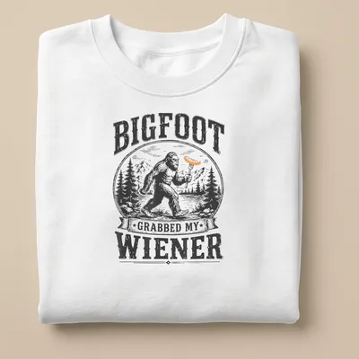 Vintage woodcut print of Bigfoot with humorous text about a wiener — printed on a unisex sweatshirt