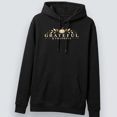 Elegant golden pumpkin T-shirt with Grateful & Thankful lettering — printed on a unisex hoodie