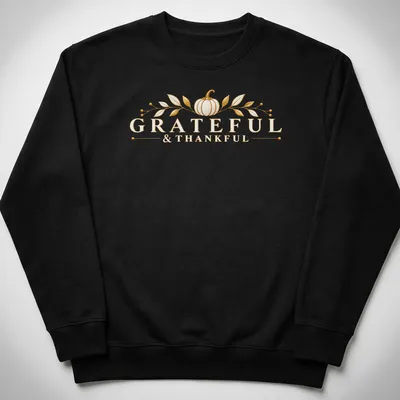Elegant golden pumpkin T-shirt with Grateful & Thankful lettering — printed on a unisex sweatshirt