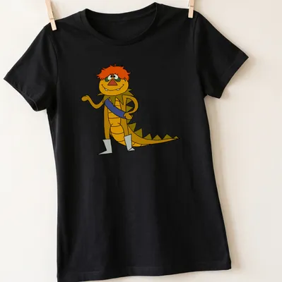 Cartoon design featuring H.R. Pufnstuf with vibrant colors and playful style. — printed on a women's shirt