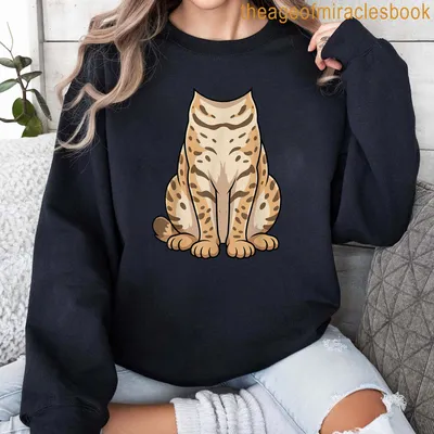 Kawaii cartoon cat in a Highlander costume on a t-shirt — printed on a sweatshirt