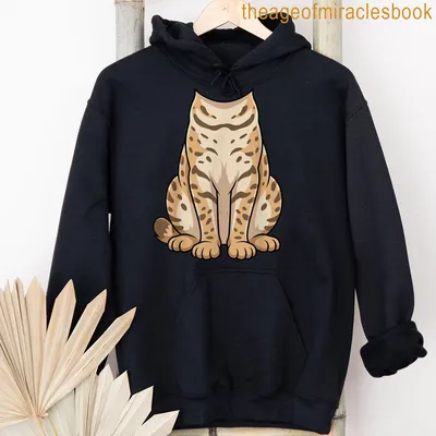 Kawaii cartoon cat in a Highlander costume on a t-shirt — printed on a unisex hoodie
