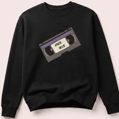 Cartoon-style shirt with a VHS tape and bats, featuring bold 'HORROR MOVIE' text. — printed on a unisex sweatshirt