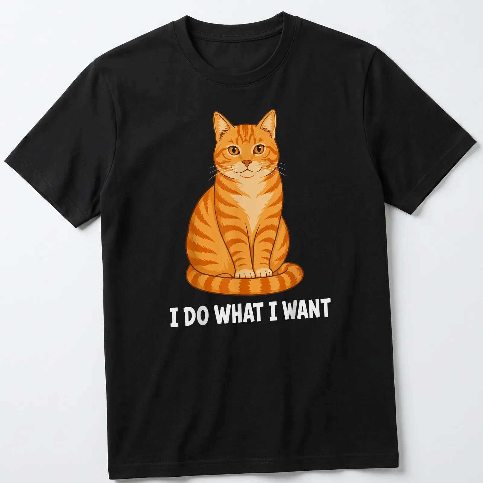 Cartoon of an orange tabby cat with text saying 'I DO WHAT I WANT' in colorful letters — printed on a unisex t-shirt