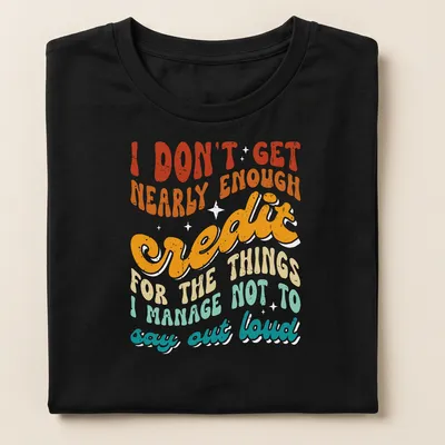 Bold retro typography t-shirt with colorful sarcastic text design — printed on a women's shirt
