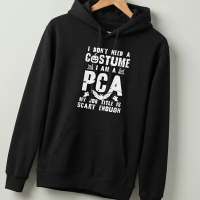 Funny Halloween t-shirt with bold text I Don't Need A Costume I Am A PCA — printed on a unisex hoodie