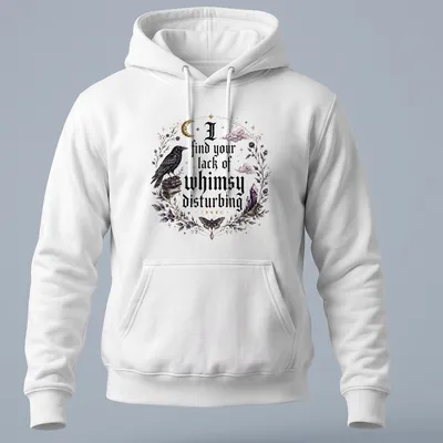 Gothic t-shirt featuring a crow and crystals with the phrase about whimsy — printed on a unisex hoodie