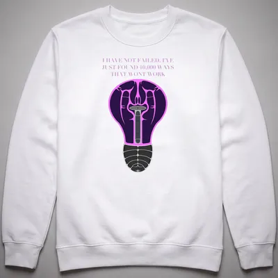 Illustration of a light bulb with motivational text in purple, black, pink, and white — printed on a unisex sweatshirt