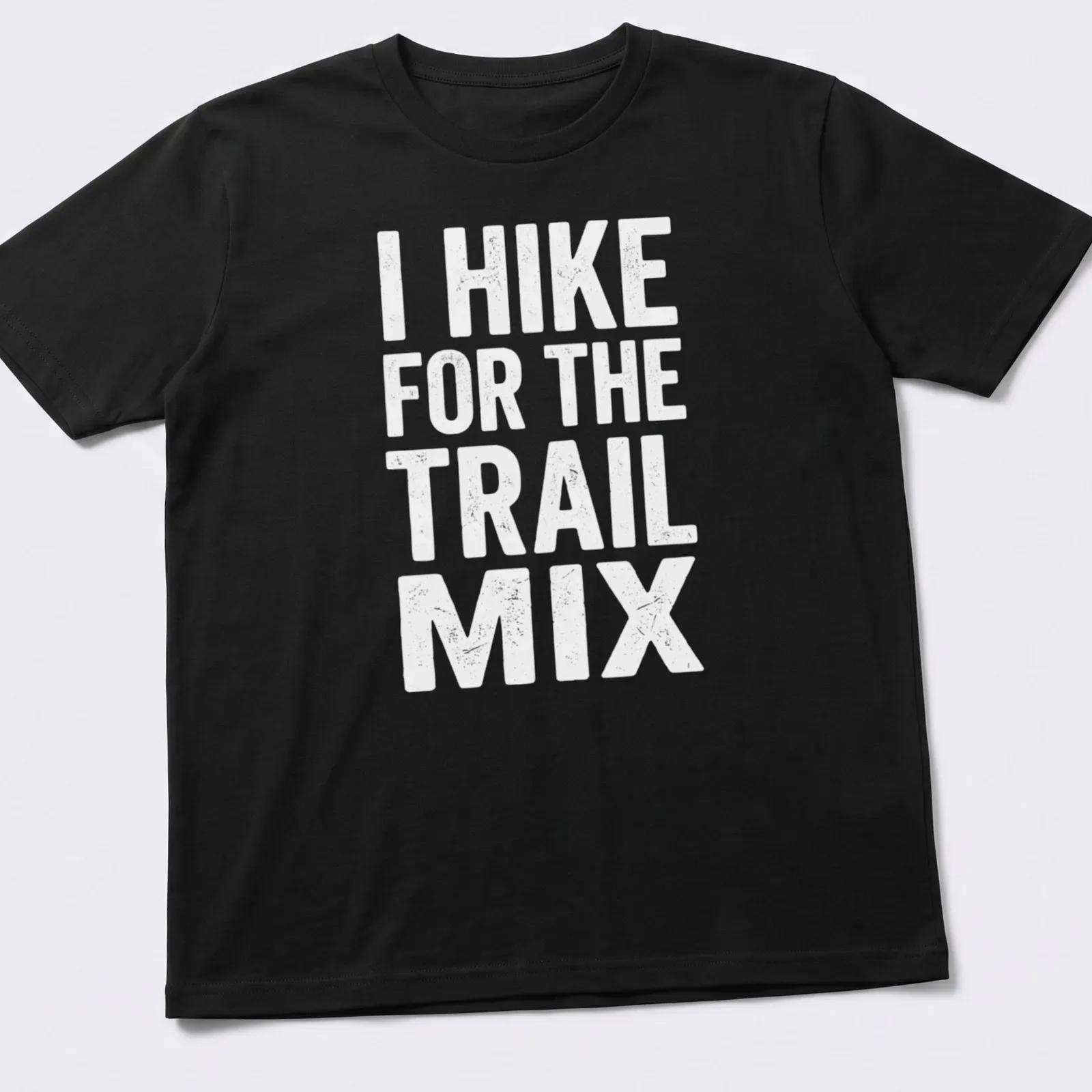 Hiking humor shirt with playful typography in green, brown, and yellow — printed on a unisex t-shirt