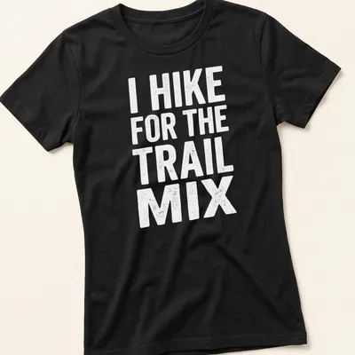 Hiking humor shirt with playful typography in green, brown, and yellow — printed on a women's shirt