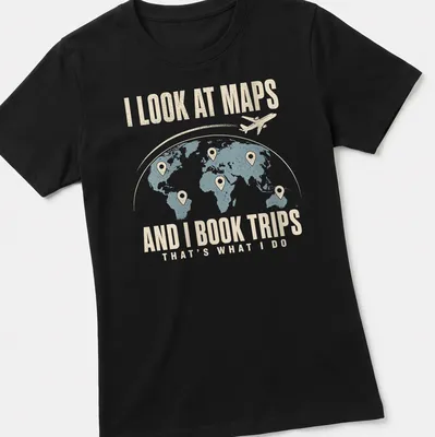 Vintage travel globe and airplane design with text about travel plans — printed on a women's shirt