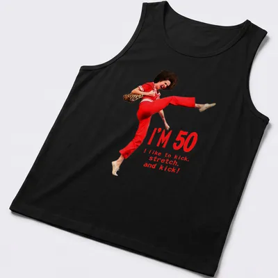 Funny 50th birthday T-shirt featuring a character kicking with humorous text — printed on a tank top