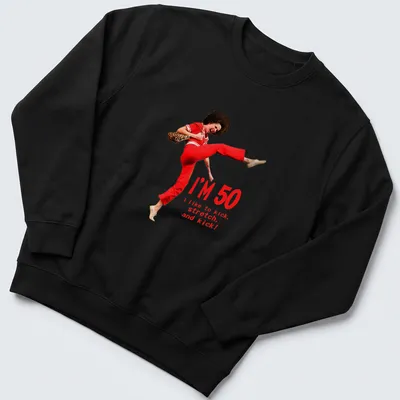 Funny 50th birthday T-shirt featuring a character kicking with humorous text — printed on a unisex sweatshirt