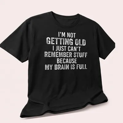 Bold text t-shirt humorously referencing memory loss with a brain illustration — printed on a unisex t-shirt (angled view)