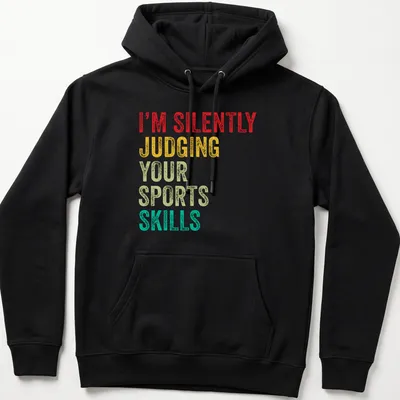 Colorful typography design stating 'I'm Silently Judging Your Sports Skills' in bold letters. — printed on a unisex hoodie