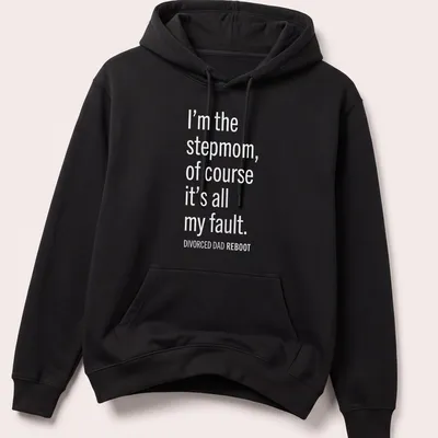 Bold white text design stating 'I’m the stepmom, of course it’s all my fault. DIVORCED DAD REBOOT' — printed on a unisex hoodie
