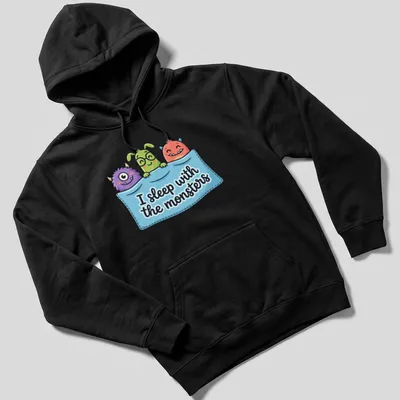 Kawaii cartoon monsters with the phrase I sleep with the monsters in bright colors. — printed on a unisex hoodie