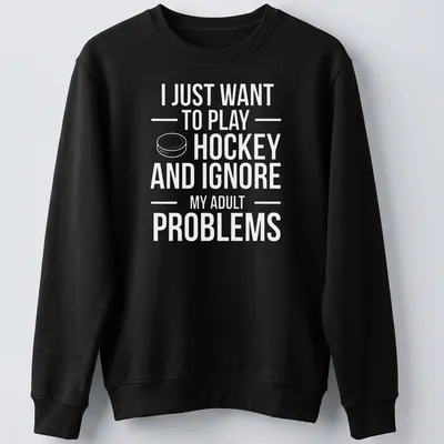 Bold typography T-shirt with the phrase about ignoring adult problems and playing ice hockey — printed on a unisex sweatshirt