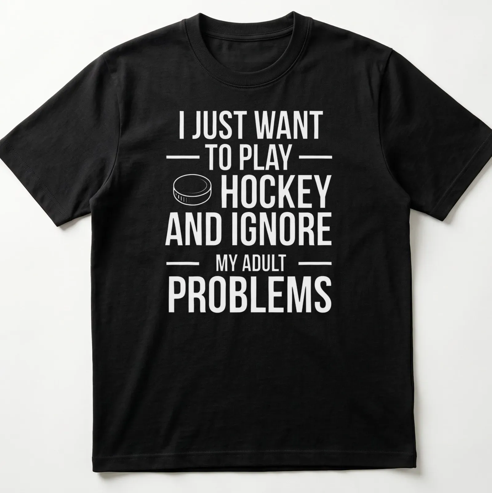 Bold typography T-shirt with the phrase about ignoring adult problems and playing ice hockey — printed on a unisex t-shirt