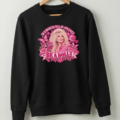 Colorful tribute to Dolly Parton with whimsical lettering and floral elements. — printed on a unisex sweatshirt