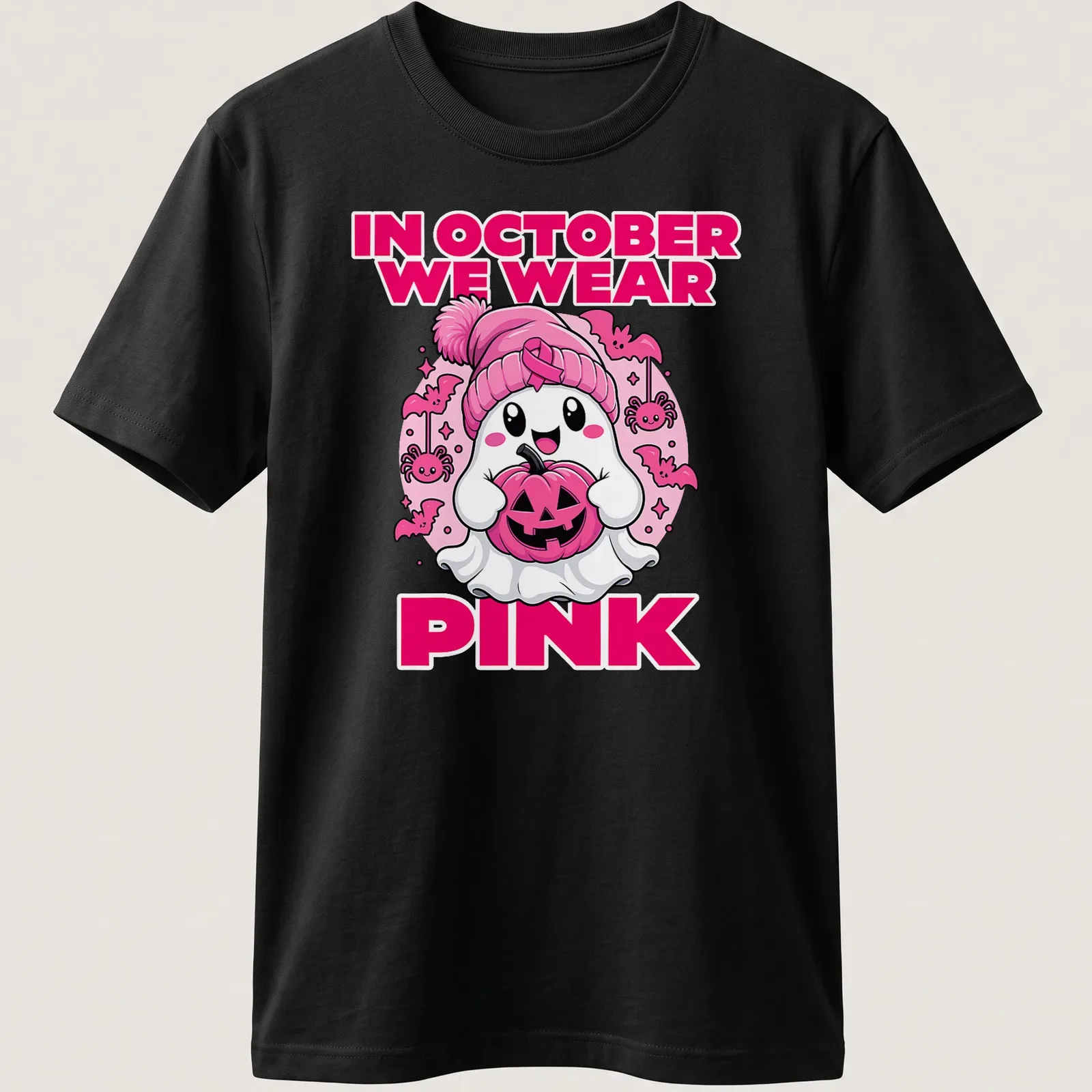 Kawaii ghost holding a pumpkin with the text 'In October We Wear Pink' — printed on a unisex t-shirt