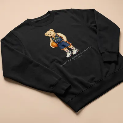 Realistic illustration of a bear playing basketball, with team text. — printed on a unisex sweatshirt