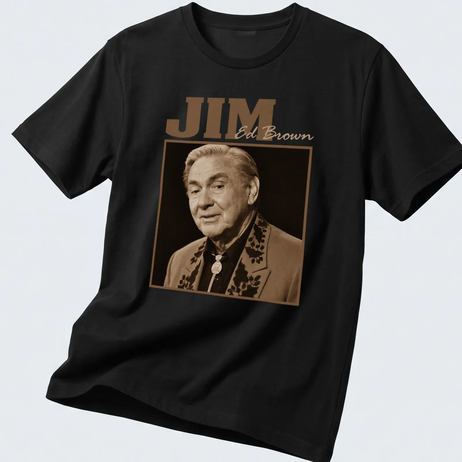 Vintage sepia design featuring JIM Ed Brown in classic font. — printed on a unisex t-shirt