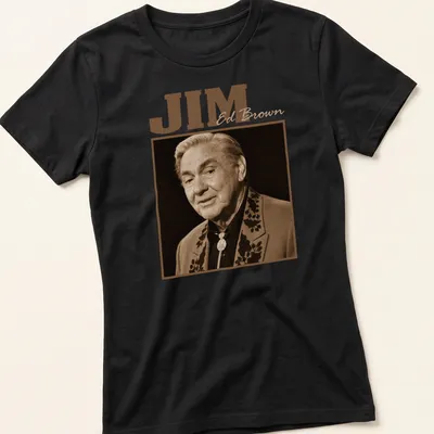 Vintage sepia design featuring JIM Ed Brown in classic font. — printed on a women's shirt
