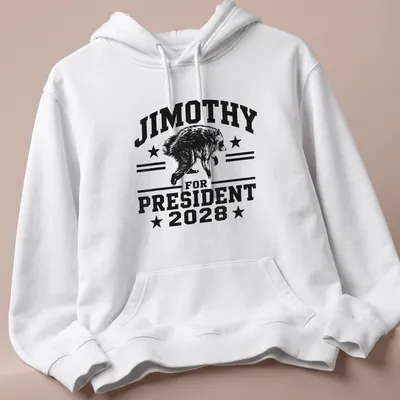 Bold graphic of a raccoon and text 'JIMOTHY FOR PRESIDENT 2028' in black and white — printed on a unisex hoodie