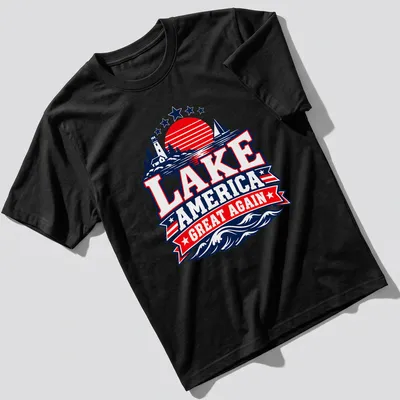 Vintage Americana style t-shirt with a lake scene featuring a lighthouse and sailboat