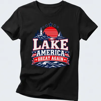 Vintage Americana style t-shirt with a lake scene featuring a lighthouse and sailboat — printed on a women's shirt